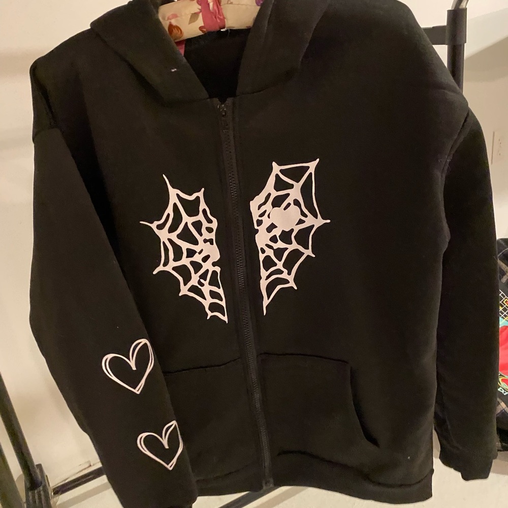 Zippered hoodie  with spider web design  hearts on both sleeves